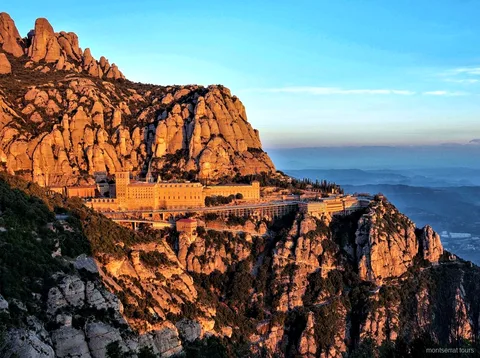 Cable car ascending above Montserrat Monastery on the hiking day tour